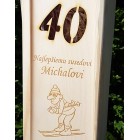 Dřevěný obal lyžaře